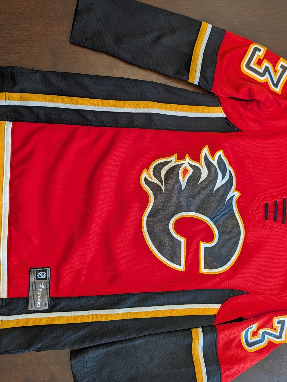 Fanatics Red Hockey Jersey with Black, White & Gold Striping